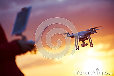 Drone pilotage at sunset Stock Photo