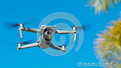 Drone. Professional drone with 5K camera for take a video, photo, film, movie footage. Aerial photography. Quadcopter or Quadrotor Stock Photo