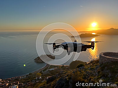 Drone shoots the island of Sveti Stefan at sunset Stock Photo