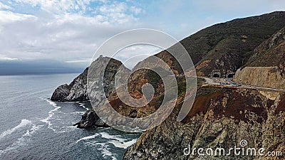 Drone shot of the rocks on Gray Whale Cove State Beach in California Stock Photo