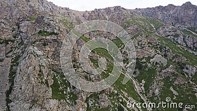 Drone view of a green gorge with high rocky cliffs Stock Photo