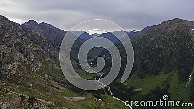 Drone view of a green gorge with high rocky cliffs Stock Photo