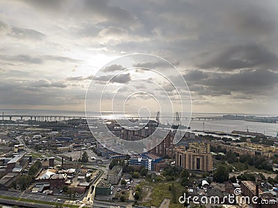 Drone view of the industrial part of St. Petersburg, Kanonersky island with Western high-speed diameter and the Gulf of Finland on Stock Photo