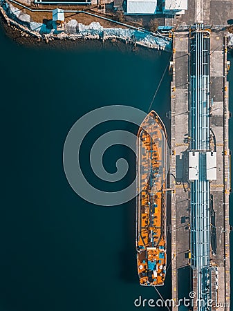 Drone view of a ship in the port Stock Photo
