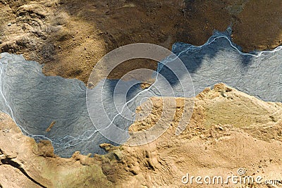 Drone view of the river in the glacier valley. View of the moraines. Landscape from the air. River on a moraine. Landscape with s Stock Photo
