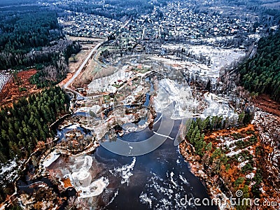 drone view of a small village during a winter flood, showcasing the destruction and devastation of nature Stock Photo