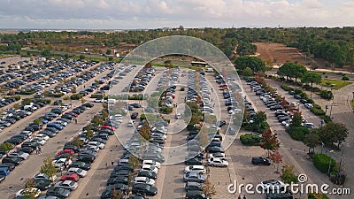 Drone view urban parking full of vehicles. Crowded city carpark at shopping mall Stock Photo