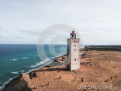 Dronephoto of Rubjerg Knude lighthouse, Denmark. Stock Photo