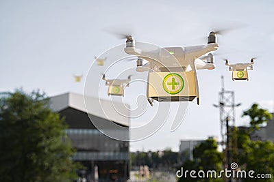 Drones carry medical help, medicines in boxes, Covid19 aid Stock Photo