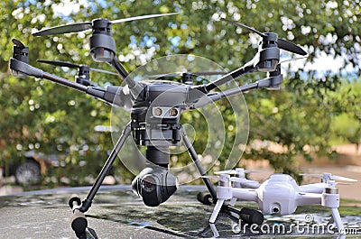 DRONES - Large & Small Camera UAV / UAS Stock Photo