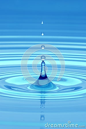 Drop of water in blue Stock Photo