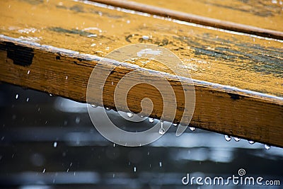 Drop of water on wood with raindrop Stock Photo