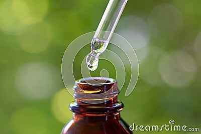 Dropper and Glass Bottle Stock Photo