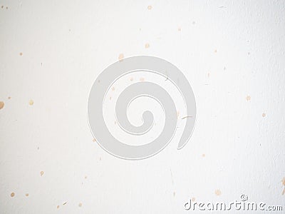 Drops on a white surface. Splashes of wine on the white wall. Dirty surface. To be cleaned Stock Photo