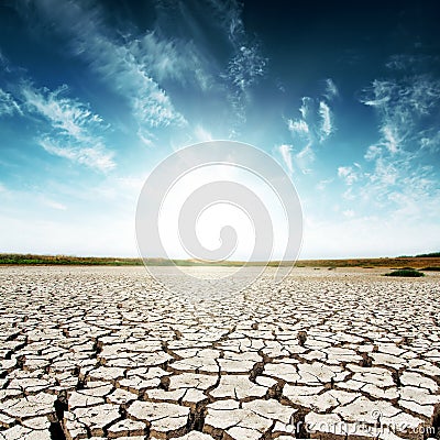 Drought earth and sunset in dark sky Stock Photo