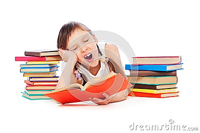 Drowsy little girl with books Stock Photo