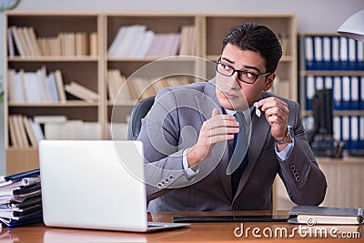 The drug addict businessman in the office Stock Photo