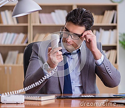 The drug addict businessman in the office Stock Photo