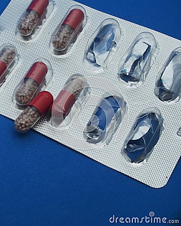 The drug in capsules. Capsules lie in plastic transparent packaging Stock Photo