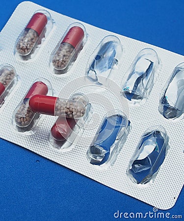 The drug in capsules. Capsules lie in plastic transparent packaging Stock Photo