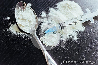 Drug use, addiction and substance abuse concept - close up of sp Stock Photo