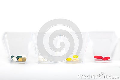 Drugs doses in glasses Stock Photo