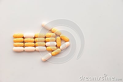 Drugs pills in an arrow shape Stock Photo