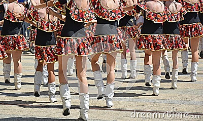 Drum majorettes dancing at a festival Stock Photo