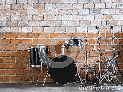 Drum Music instrument Sound equipment on Brick wall Stock Photo