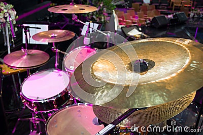 Drum set and music notes in concert studio Stock Photo