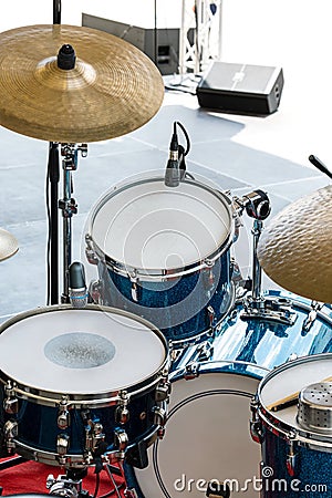 Drum set on outdoor stage ready for play Stock Photo