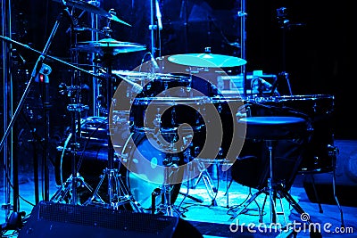 drum set on stage in a concert hall. Large-sized photo with soft change selectivity. Vintage live music background Stock Photo