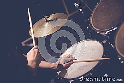 Drummer playing drums Stock Photo