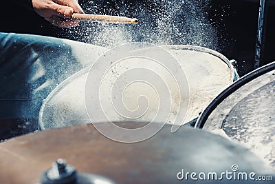 Drummer rehearsing on drums before rock concert. Man recording music on drum set in studio Stock Photo