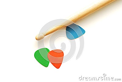 Drumstick and guitar picks Stock Photo