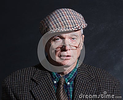 Drunk English gentleman in tweeds Stock Photo