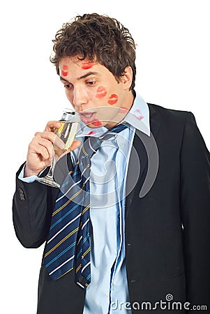 Drunk kissed man drinking wine Stock Photo