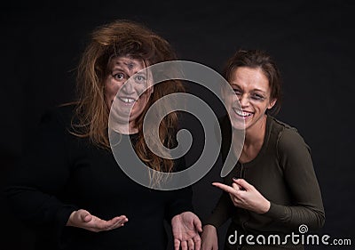 Drunk two women over black background Stock Photo