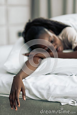 Drunken girl in the bed Stock Photo