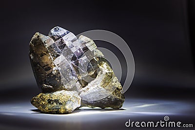 A druse of smoky quartz with epidote, crystal, stone Stock Photo