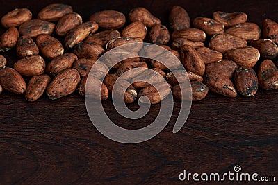 Dry cocoa seeds background Stock Photo