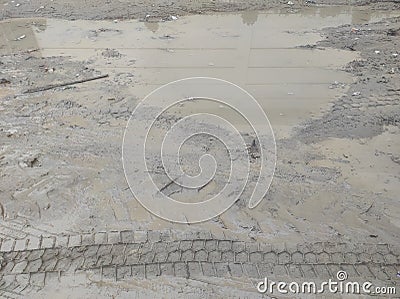 Mud splattered background Texture.Soil.Dry cracked dirt.Cracked mud.Background texture of the soil. Stock Photo