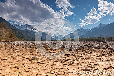 Dry cracked river earth ground and blue sky Stock Photo
