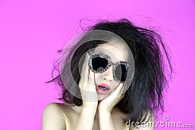 Dry and damaged hair problems, Young woman worry about her messy tangled hair Stock Photo