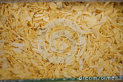 Dry dehydrated cut onions texture, top view. seasoning, flavoring cooking ingredient. healthy spicy vegetables Stock Photo