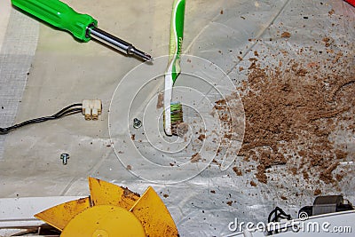 Dry dirt and dust cleaned from a kitchen exhaust fan. Close-up. Air purification concept Stock Photo