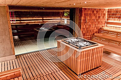 Dry Finnish sauna with double oven and large panoramic window Stock Photo