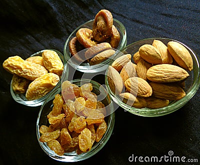 Dry fruits date palm fig currant raisin almonds Stock Photo