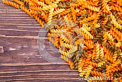 Dry fussili pasta of different colors Stock Photo