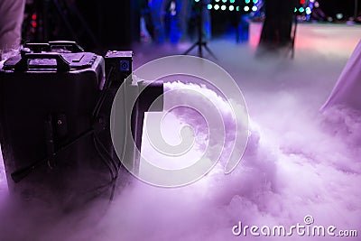 Dry ice low fog machine with hands on for wedding first dance in restaurants Stock Photo